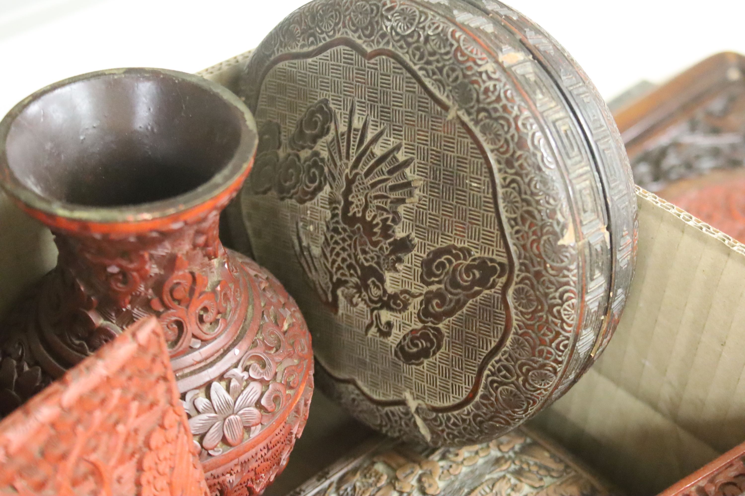 An assortment of Chinese cinnabar lacquer and other later boxes, to include a pair decorated with bears in woodland, largest 17 x 10cm (6)